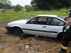 Photo 1: Gaining access quickly to a rear seat patient might require unconventional skills. Photo 1: Gaining access quickly to a rear seat patient might require unconventional skills.