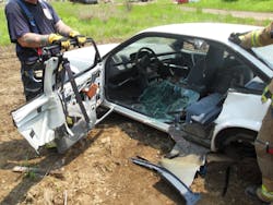 Photo 4: When the third-door-full-removal procedure is employed, if time permits, the entire assembly can be removed by attacking the hinges. Photo 4: When the third-door-full-removal procedure is employed, if time permits, the entire assembly can be removed by attacking the hinges.