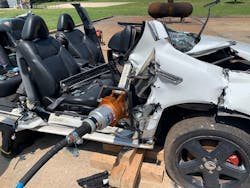 Photo 7: For the high-dash-displacement procedure, after relief cuts are made and the spreader tips are set into place, additional cribbing/support should be put in place below the A-pillar. Photo 7: For the high-dash-displacement procedure, after relief cuts are made and the spreader tips are set into place, additional cribbing/support should be put in place below the A-pillar.