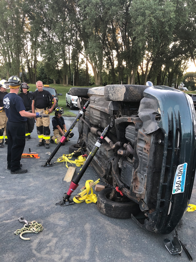 The ratchet strap’s connection, to keep the base of the rescue strut from kicking out under load, is one of the most challenging tasks of correctly placing a strut.