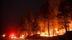 The Caldor Fire burns along Highway 89 west of Lake Tahoe, CA, on Sept. 2, 2021.