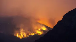 A section of the KNP Complex burns on a hillside near the entrance to Sequoia National Park in Three Rivers, CA, on Sept. 15, 2021.