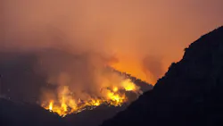 A section of the KNP Complex burns on a hillside near the entrance to Sequoia National Park in Three Rivers, CA, on Sept. 15, 2021.
