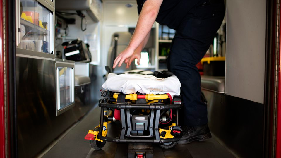 Erik Sonnenberg, a paramedic with Tualatin Valley Fire and Rescue, prepares an ambulance for inspection at their Newberg location on Sept. 29, 2021.