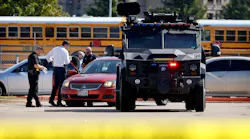 Emergency responders work the scene of a school shooting in Arlington, TX, on Wednesday, Oct. 6, 2021.