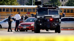 Emergency responders work the scene of a school shooting in Arlington, TX, on Wednesday, Oct. 6, 2021. Emergency responders work the scene of a school shooting in Arlington, TX, on Wednesday, Oct. 6, 2021.