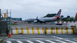 An American Airlines flight was evacuated on landing at LaGuardia Airport with police, fire, and EMS personnel called to the scene after a some passengers reported suspicious activity by a fellow flier on Saturday, Oct. 9, 2021.