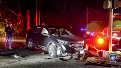 The scene of a crash that caused life-threatening injuries to a motorcycle rider who became pinned under an SUV in Cohasset, MA, on Tuesday, Oct. 12, 2021.