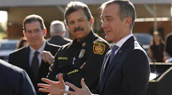 Los Angeles Mayor Eric Garcetti, right, speaks to the media alongside LAFD Chief Ralph Terrazas at a February 2020 event.