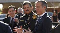 Los Angeles Mayor Eric Garcetti, right, speaks to the media alongside LAFD Chief Ralph Terrazas at a February 2020 event.