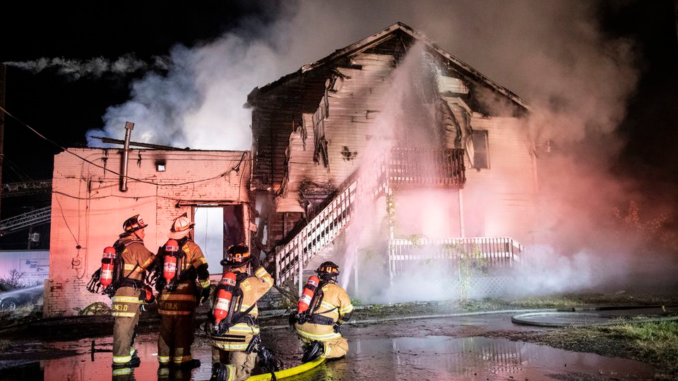 Firefighters battle a fire at a warehouse in New Cumberland, PA, on Thursday, Oct. 21. 2021.