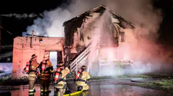 Firefighters battle a fire at a warehouse in New Cumberland, PA, on Thursday, Oct. 21. 2021.
