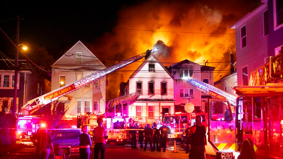 A two-alarm fire that damaged three homes on Chadwick Ave. in Newark, NJ, on Thursday, Oct. 21, 2021.