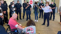 Capt. Christopher Gadomski and Fire Rescue Officer Pauline Perez hold hands during a prayer after Perez was released from the burn center two weeks after she was injured in an explosion. Capt. Christopher Gadomski and Fire Rescue Officer Pauline Perez hold hands during a prayer after Perez was released from the burn center two weeks after she was injured in an explosion.