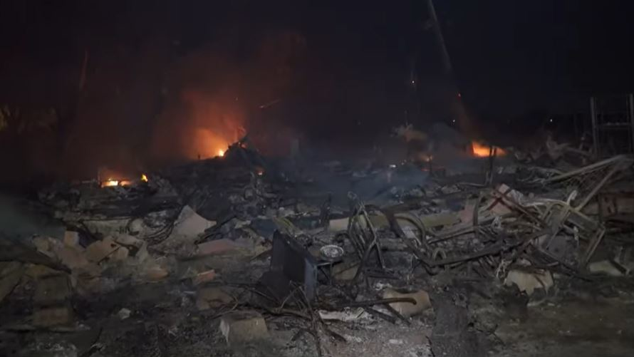A mobile home lies in ruins after a brush fire swept through a mobile home park near Isleton, CA, and destroyed 30 structures on Monday, Oct. 11, 2021.