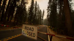 A gate is closed near the entrance to California's Sequoia National Park as the KNP Complex Fire continues to threaten groves of giant sequoia trees.