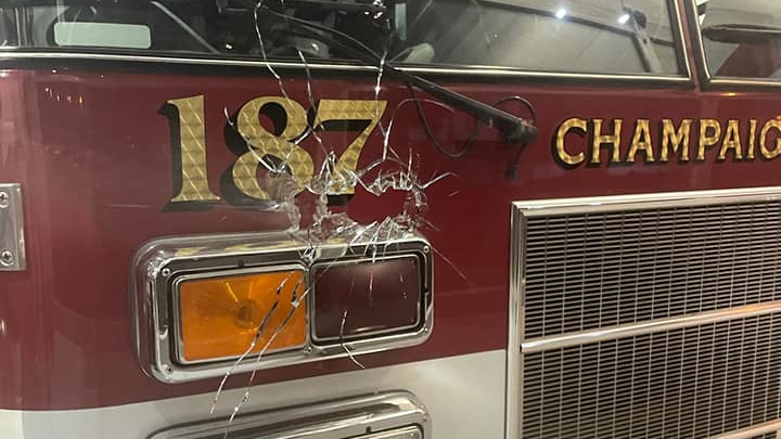An apparatus bay door window that was pierced by gunfire at Champaign, IL, Fire Station 1 on Sunday, Oct. 10, 2021.