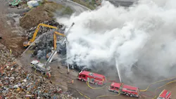 A massive scrap pile burns at the Port of Coeymans, NY, on Wednesday, Oct. 27, 2021.
