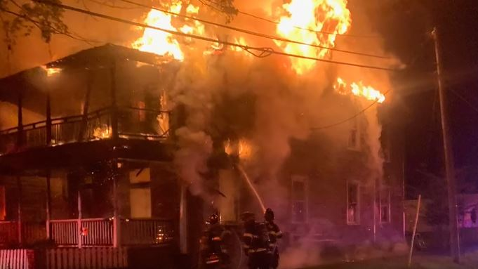 A multi-story residential building burns in Columbia, SC, on Monday, Oct. 18, 2021.