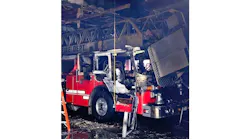 An aerial apparatus is badly damaged after a fire erupted inside a Dunellen, NJ, fire station on Tuesday, Oct. 12, 2021.