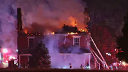 Flames engulf the upper floor and roof of a historic farmhouse in Hellam Township, PA, on Monday, Oct. 25, 2021.