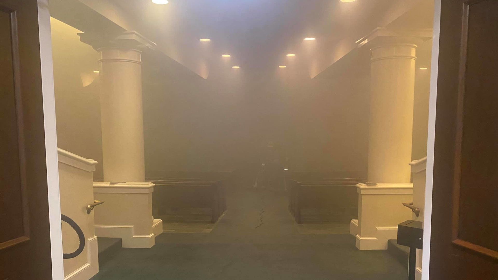 A photo posted to Facebook shows thick smoke inside the entryway at the historic First Baptist Church in Montgomery, AL, during a fire on Sept. 30, 2021.