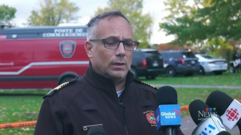 Montreal Fire Chief Richard Liebmann speaks to the media after the body of firefighter Pierre Lacroix was recovered from the St. Lawrence River on Monday, Oct. 18, 2021.