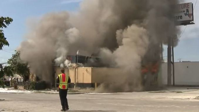 An abandoned restaurant burns in San Antonio, TX, on Thursday, Oct. 22, 2021.