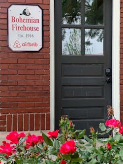 The entrance to the second floor AirBNB in the former fire station, which opened in 1916. The entrance to the second floor AirBNB in the former fire station, which opened in 1916.