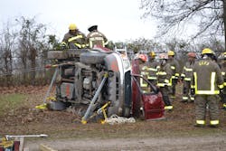 Having completed a stabilization scenario that found the side of the vehicle “obstructed,” members of a rescue team carry out other technician-level tasks that are included in “Technician-Level Hands-On Skills Checklist for a Roof-Resting Passenger Vehicle.” Having completed a stabilization scenario that found the side of the vehicle “obstructed,” members of a rescue team carry out other technician-level tasks that are included in “Technician-Level Hands-On Skills Checklist for a Roof-Resting Passenger Vehicle.”