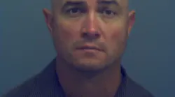Shawn Michael Hanke in a police mug shot.