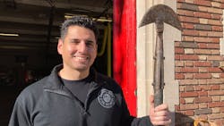 Hartford firefighter Ashley Shapiro holds an original Hartford hook head that he bolted to a new handle. His company, Capital City Fire Helmet, is now producing a modern version of the old fire hooks, which were built by fire department machinists but fell out of use a few decades ago. Hartford firefighter Ashley Shapiro holds an original Hartford hook head that he bolted to a new handle. His company, Capital City Fire Helmet, is now producing a modern version of the old fire hooks, which were built by fire department machinists but fell out of use a few decades ago.