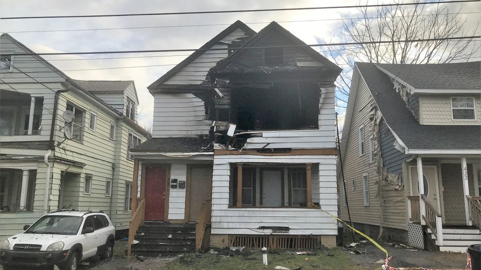 A two-family home that was damaged by fire in Syracuse, NY, on Monday, Nov. 22, 2021.