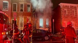 Firefighters operate at an overnight fire that claimed three lives and injured five children Nov. 22, 2021. Firefighters operate at an overnight fire that claimed three lives and injured five children Nov. 22, 2021.