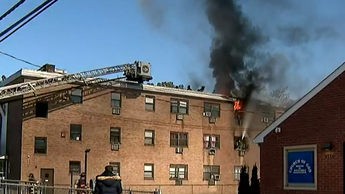 Bridgeport firefighters work to control a two-alarm apartment fire on Friday, Nov. 5, 2021.