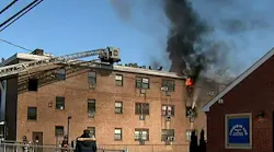 Bridgeport firefighters work to control a two-alarm apartment fire on Friday, Nov. 5, 2021.