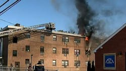 Bridgeport firefighters work to control a two-alarm apartment fire on Friday, Nov. 5, 2021. Bridgeport firefighters work to control a two-alarm apartment fire on Friday, Nov. 5, 2021.