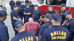 Captain Gadomski visits with fellow firefighters after being discharged. Captain Gadomski visits with fellow firefighters after being discharged.