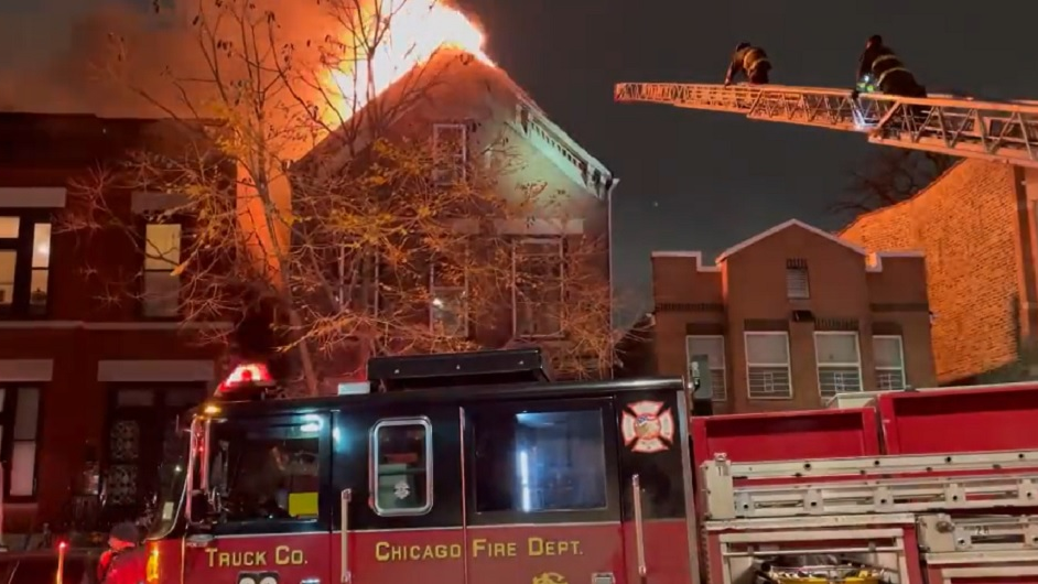 Chicago firefighters work to control a structure fire on Thursday, Nov. 18, 2021.