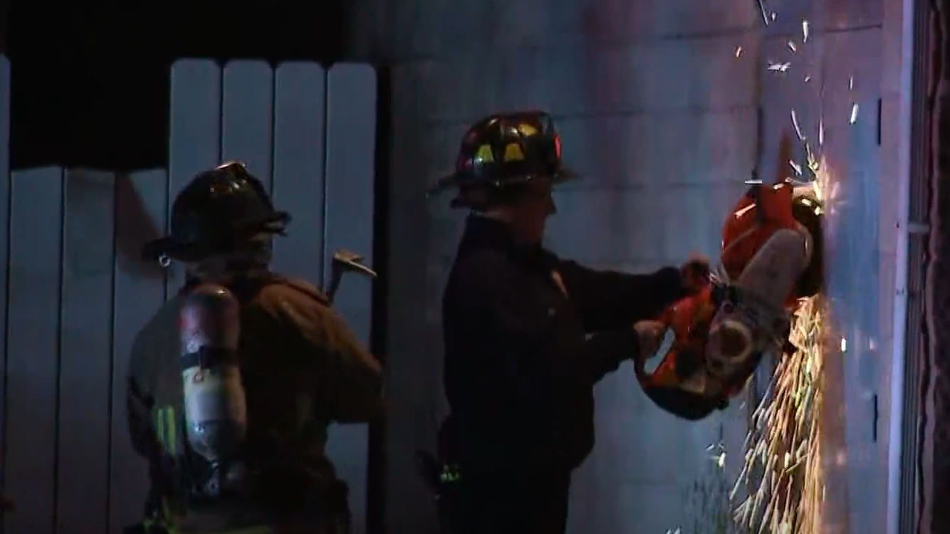 Columbus firefighters gaining access to a two-alarm church fire on Nov. 22, 2021.