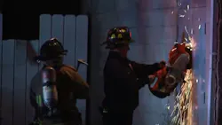 Columbus firefighters gaining access to a two-alarm church fire on Nov. 22, 2021.