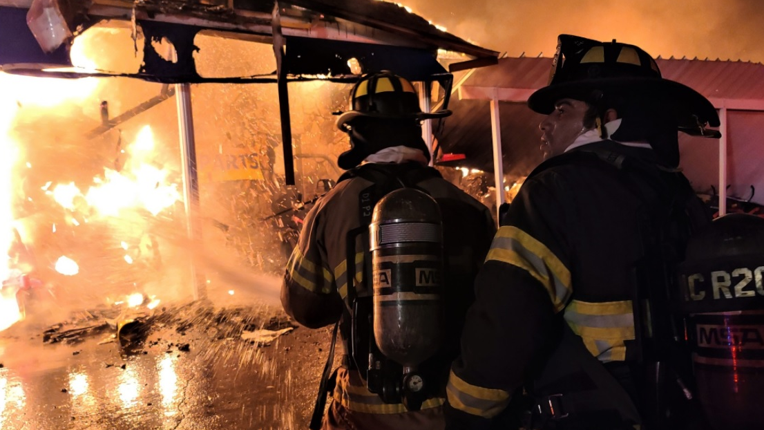 Marion County firefighters operate at a defensive commercial fire in Ocala, FL, on Thursday, Nov. 18, 2021.