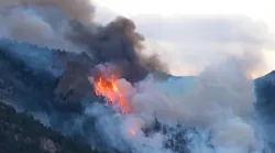 Wind driven fire climbs Kruger Rock near Estes Park.