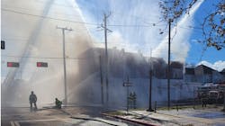 Firefighters operate multiple master streams to control a commercial fire in Newport News, VA, on Thursday, Nov. 18, 2021. Firefighters operate multiple master streams to control a commercial fire in Newport News, VA, on Thursday, Nov. 18, 2021.