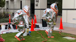 Hazardous Materials team members prepare to make entry to monitor for leaks at a building on the campus of UC Santa Barbara in Isla Vista, CA.