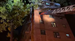 An FDNY aerial ladder is extended to a window in a fourth-floor Upper West Side apartment where two people died in a fire on Thursday, Nov. 11, 2021.