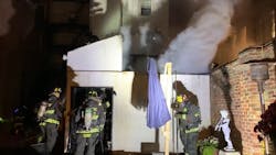 Firefighters work to control a fire adjacent to a DC historical landmark on Nov. 23, 2021. Firefighters work to control a fire adjacent to a DC historical landmark on Nov. 23, 2021.