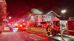 Firefighters on scene battling a three-alarm structure fire on Wednesday, Nov 3, 2021.