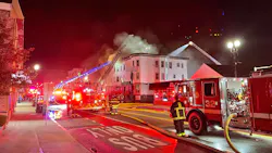 Firefighters on scene battling a three-alarm structure fire on Wednesday, Nov 3, 2021.