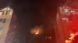 FDNY firefighters battle a five-alarm fire in Manhattan apartment building.